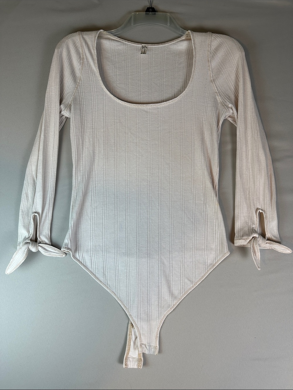 Women's Cream Ribbed Long-Sleeve Tie-Cuff Bodysuit